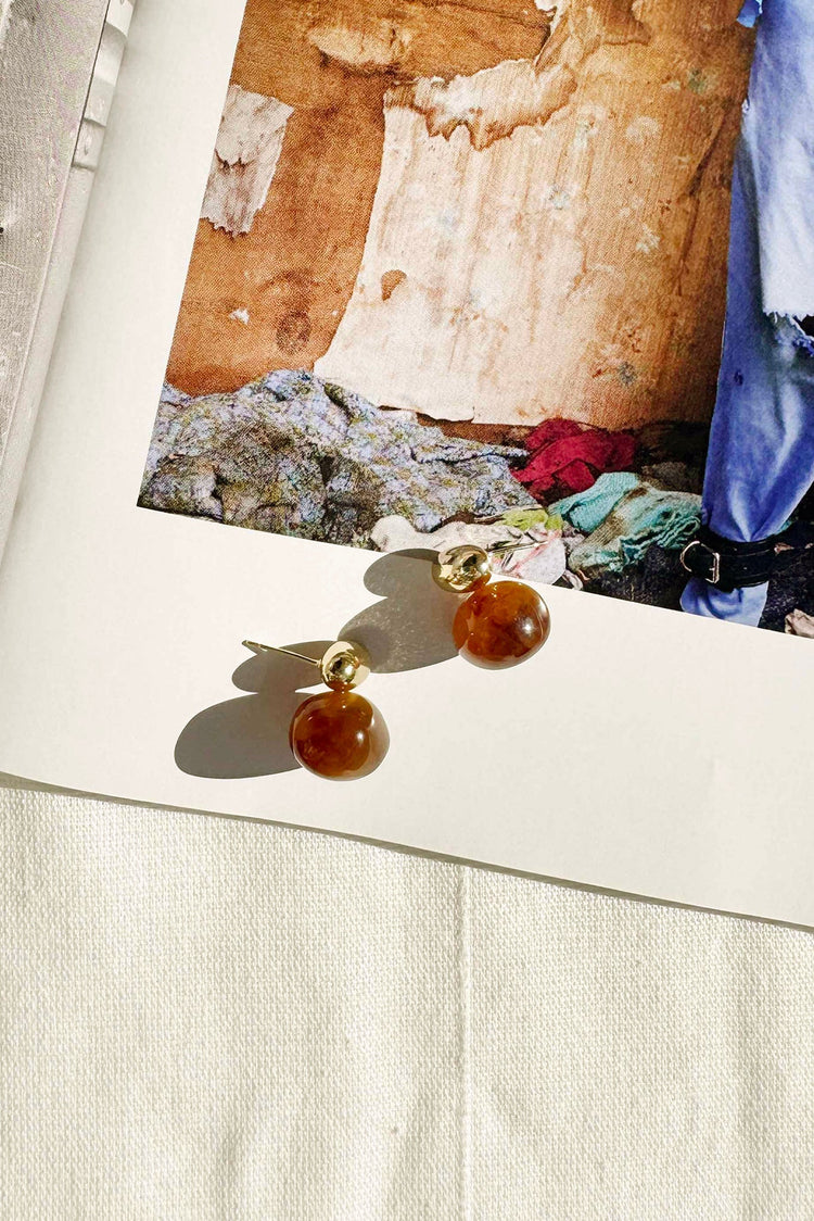 Win Instantly Earrings - Brown for women